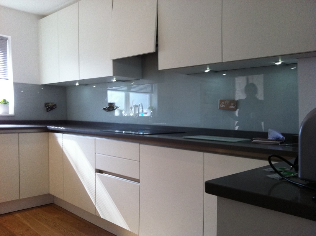 Grey glass kitchen splashback with LED lighting in Tottenham