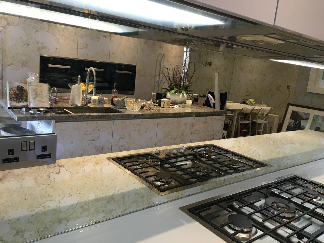 Mirror glass splashback in Tottenham luxury kitchen